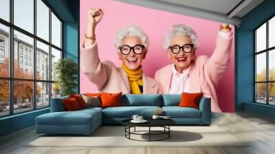 happy senior women in eyeglasses showing yes gesture isolated on pink. Generative AI. Wall mural