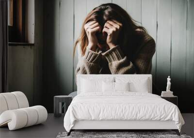 Sad and depressed woman sitting near windowsill. Depression and mental health concept. Generative AI. Wall mural