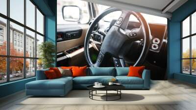 Steering wheel of luxury car Wall mural