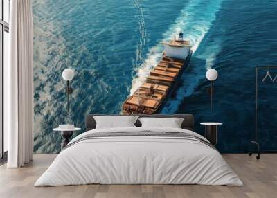 A large ship sails across the vast blue ocean. Wall mural