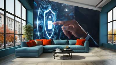 Businessman touching a digital virtual shield with a padlock icon on a hologram screen Wall mural