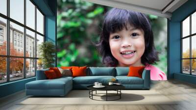 Happy smiling Asian kid. Face expression concept.  Wall mural