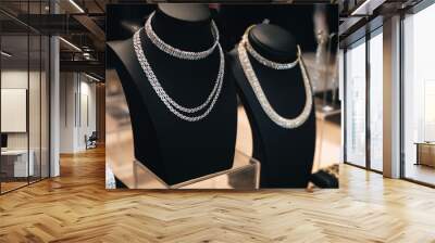 White gold jewelry, necklace on the showcase of women's accessories store Wall mural