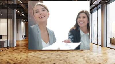 assistant passes business woman working document Wall mural