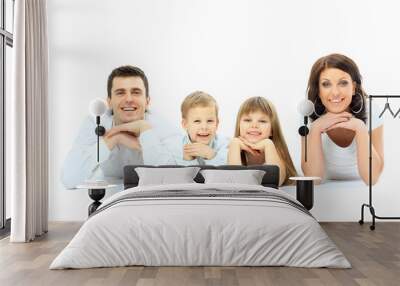 Beautiful happy family - isolated over a white background Wall mural