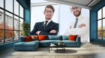 bottom view.two confident businessman standing in the office . Wall mural