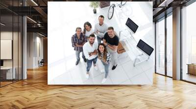 business team standing near the desktop Wall mural