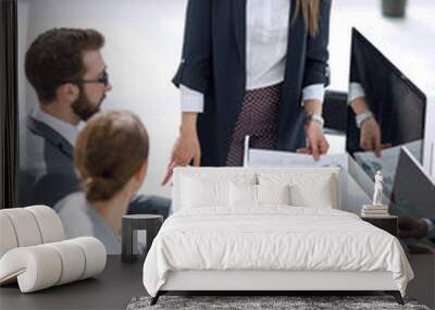 business woman discusses with the business team financial performance Wall mural