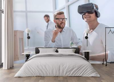 close up. designer in VR helmet sitting at his Desk. Wall mural