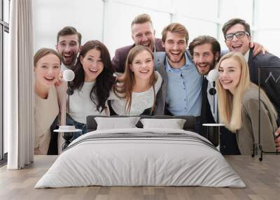 close up. group of smiling young people looking at the camera . Wall mural