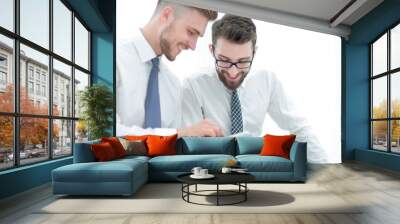 close up.two employees looking at the digital tablet screen Wall mural