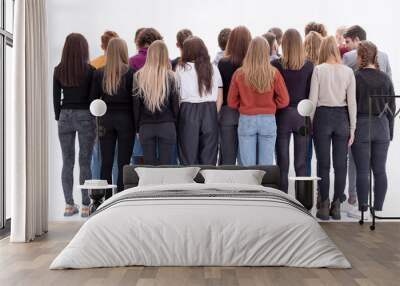 group of casual young people looking at a blank screen Wall mural