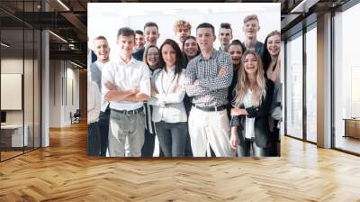 group of diverse happy people standing in a new office Wall mural