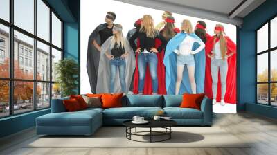 group of diverse young men in superhero cloaks are pointing at you Wall mural