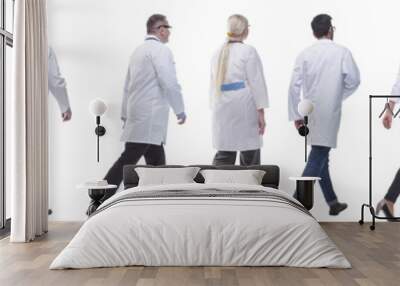 group of doctors in motion isolated on white Wall mural