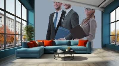 Group of happy and successful business people looking confident Wall mural