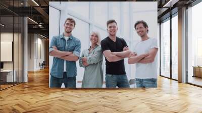 group of successful young people standing in the office Wall mural