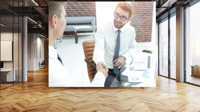 handshake of a businessman and accountant Wall mural