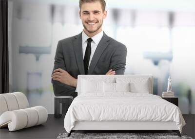 Handsome smiling confident businessman portrait Wall mural