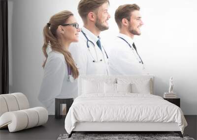 Happy doctors in formalwear looking to the side. Wall mural