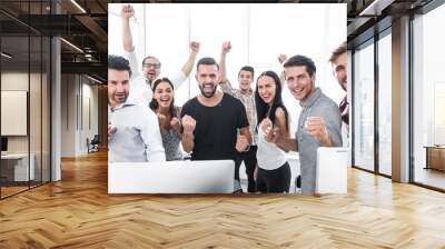 happy professional business team standing in modern office Wall mural