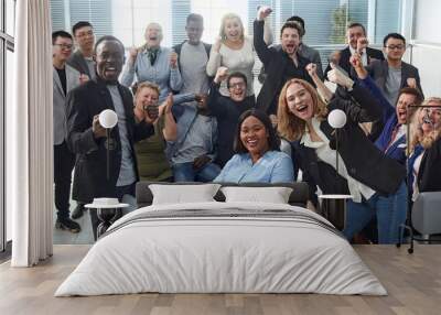 happy team of diverse corporate employees in the office lobby. Wall mural