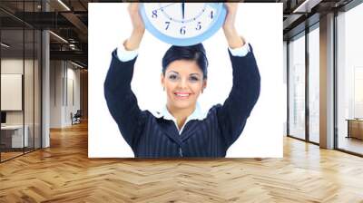 Happy woman in black with clock over white Wall mural