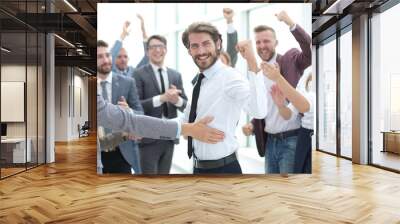 happy young businessman on business team background. Wall mural