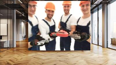 image of a group of builders with gas keys Wall mural