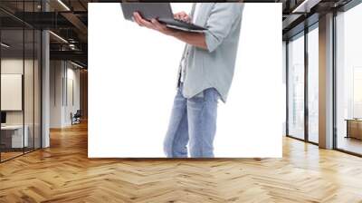 in full growth.smiling young man with laptop Wall mural