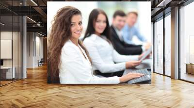 portrait of a female accountant in the workplace in front of com Wall mural