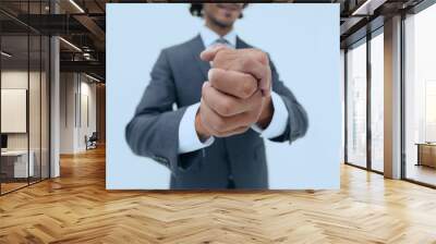 portrait of bearded business man rubbing his hands together Wall mural