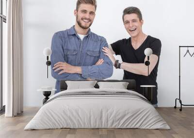 Two attractive young men isolated on a white background Wall mural