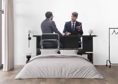 two business people talking sitting at a Desk Wall mural