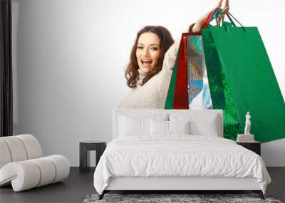 woma holding shopping bags against isolated white background.. Wall mural