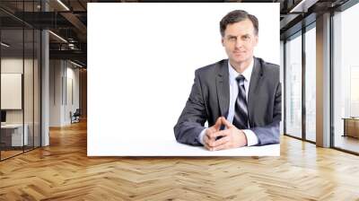 young business man on a desk, isolated on white Wall mural