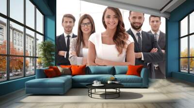 young business woman in front of the business team Wall mural