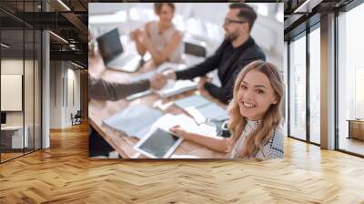 young business woman with a digital tablet at a business meeting Wall mural