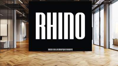 Modern strong rhino condensed alphabet display font vector illustration Wall mural