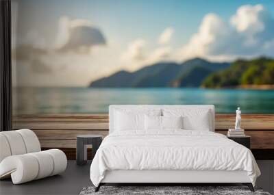 Wooden table top on blur beach background - can be used for display or montage your products Wall mural