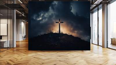 Low angle view of a glowing cross against a dark dramatic sky Wall mural