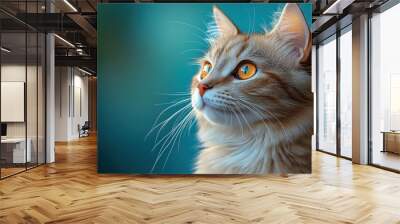 Close-up portrait of a ginger cat with bright yellow eyes, looking up and to the right, with a blurry teal background. Wall mural