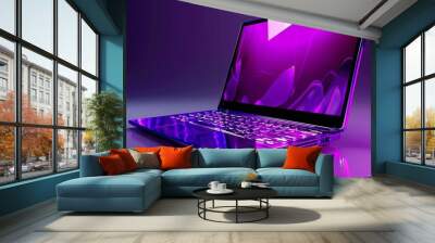 Sleek purple laptop with modern design on a clean desk surface, ideal for technology and business presentations, workspace and digital device concepts Wall mural