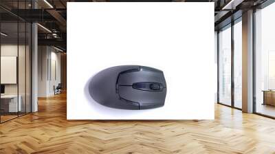 A black wireless mouse isolated on white background. selective focus. Wall mural