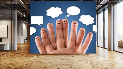 Happy group of finger smileys with social chat sign and speech b Wall mural