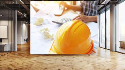 architect asian woman working with laptop, calculator and blueprints. engineer calculate and inspect Wall mural