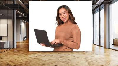 A young asian woman working with her laptop Wall mural