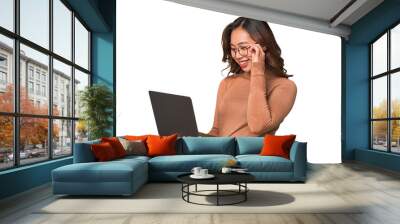 A young asian woman working with her laptop Wall mural