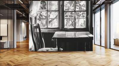 Black and white photo of old wooden table and chair in vintage room Wall mural