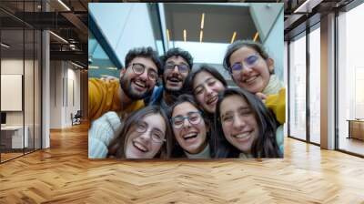 group of happy students taking selfie with mobile phone at modern school indoors Wall mural